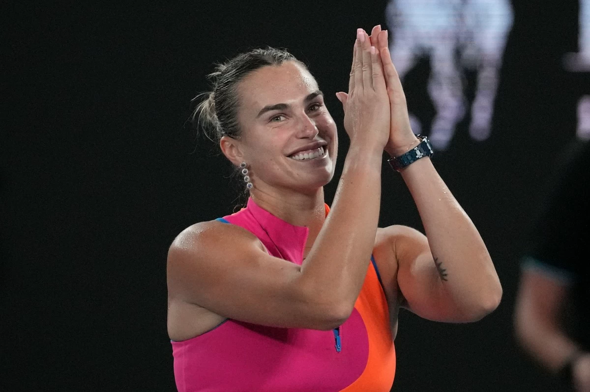 Aryna Sabalenka of Belarus celebrates after defeating Elina Svitolina of Ukraine in their semifinal match at the Australian Open tennis championship in Melbourne, Australia, Thursday, Jan. 29, 2026. (AP Photo/Dita Alangkara)