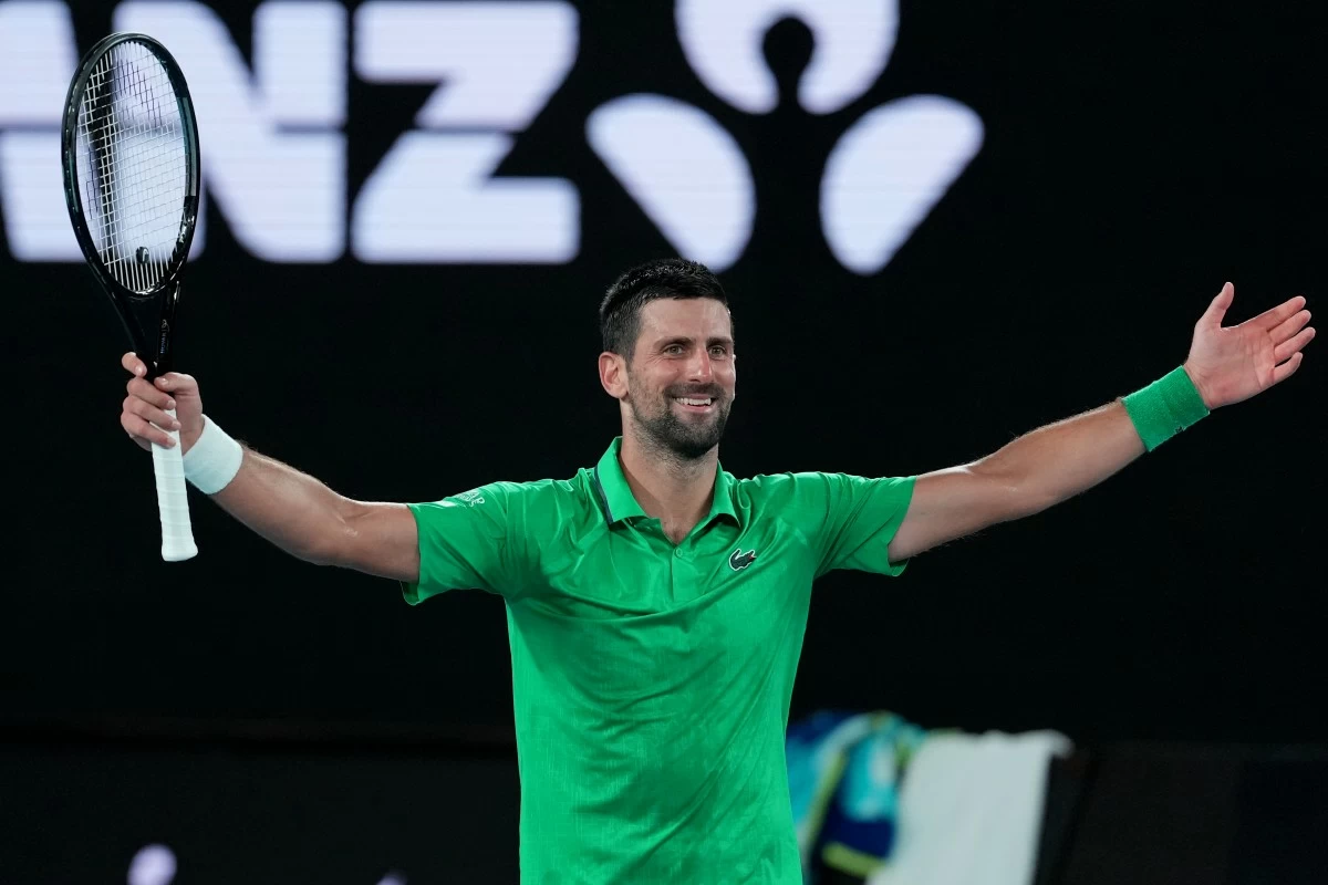 Novak Djokovic of Serbia celebrates after defeating Jannik Sinner of Italy in their semifinal match at the Australian Open tennis championship in Melbourne, Australia, early Saturday, Jan. 31, 2026. (AP Photo/Asanka Brendon Ratnayake)