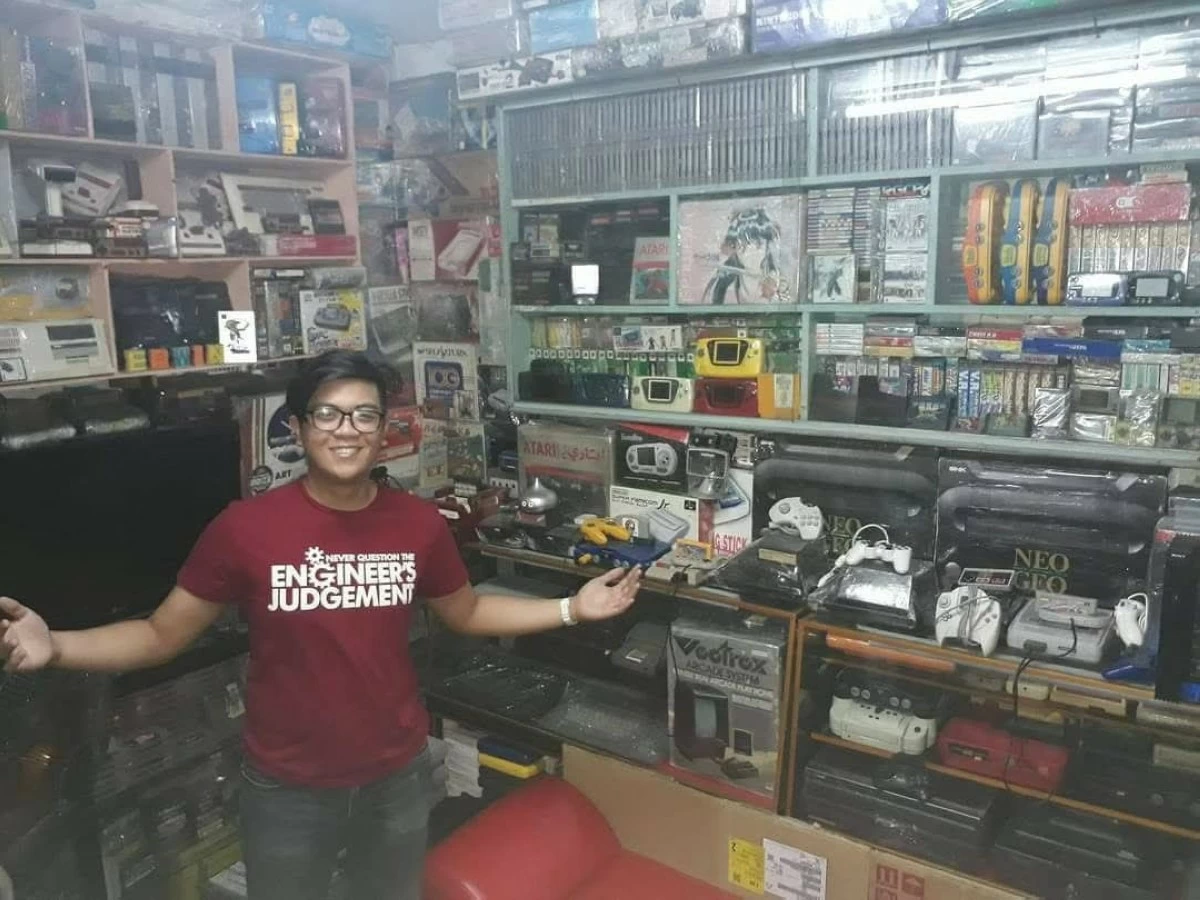 Esteban's son, professional esports shoutcaster Eugene Esteban a.k.a. Dash, poses inside the old Retrogamerph mancave (Eugene Esteban)
