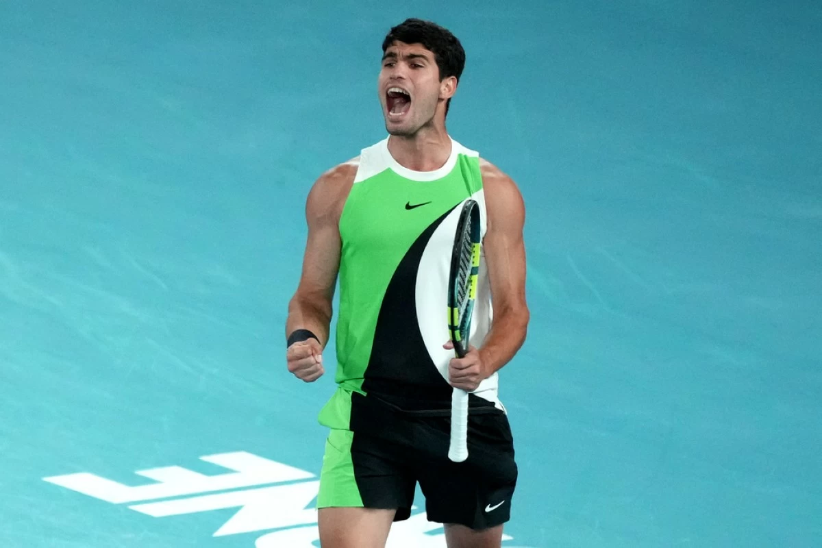 Carlos Alcaraz of Spain reacts during the men's singles final match against Novak Djokovic of Serbia at the Australian Open tennis championship in Melbourne, Australia, Sunday, Feb. 1, 2026.(AP Photo/Mark Baker)