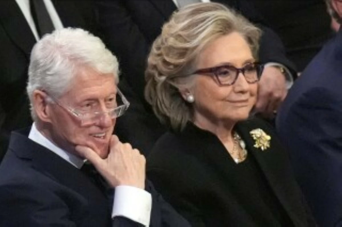 Former President Bill Clinton and former Secretary of State Hillary Clinton listen during the state funeral for former President Jimmy Carter at Washington National Cathedral in Washington, Jan. 9, 2025. (AP Photo/Jacquelyn Martin, File)
