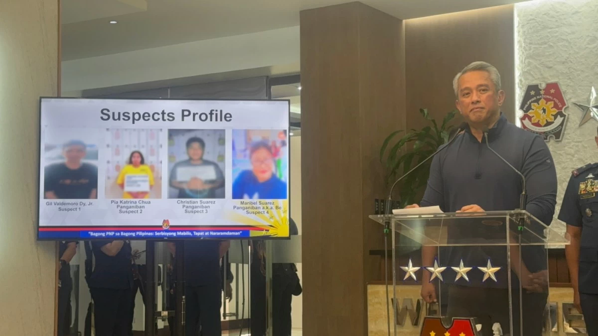 DILG Secretary Jonvic Remulla presents the photos of the four arrested suspects tagged in the killing of Police Senior Master Sergeant Diane Mollenido and her eight-year old son in Quezon City during a press briefing in Quezon City. 