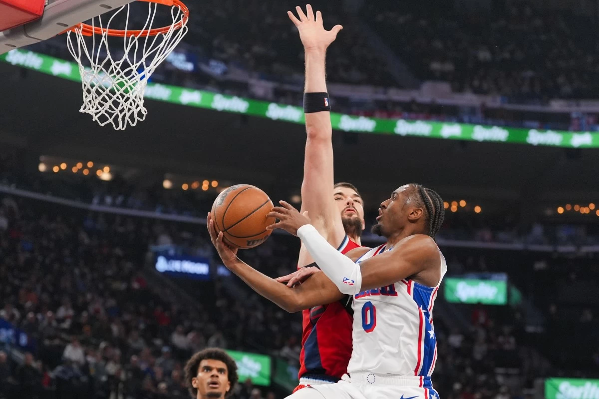 Philadelphia 76ers guard Tyrese Maxey (0) puts up a shot against Los Angeles Clippers center Ivica Zubac (40) during the first half of an NBA basketball game Monday, Feb. 2, 2026, in Inglewood, Calif. (AP Photo/Jae C. Hong)