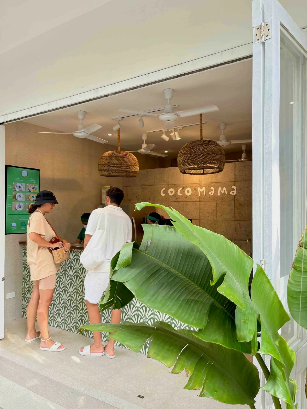 COCONUT CORNER The Coco Mama stall at D'Mall Boracay, a busy hub for locals and tourists.