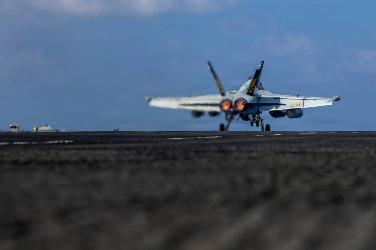 This handout image from the U.S. Navy shows an EA-18G Growler launching from the flight deck of the Nimitz-class aircraft carrier USS Abraham Lincoln in the Indian Ocean on Jan. 23, 2026. (Mass Communication Specialist Seaman Daniel Kimmelman/U.S. Navy via AP)
