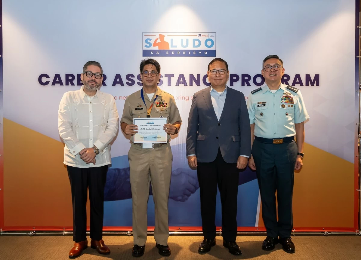 Navy Cmdr. Juphett Navida (second from left) at Ayala’s Saludo sa Serbisyo program in July 2025. He joined Ayala Corp. that December. With him, from left: Francisco Romero Milán, Ret. Gen. Emmanuel Bautista, and Lt. Gen. Rommel Roldan.