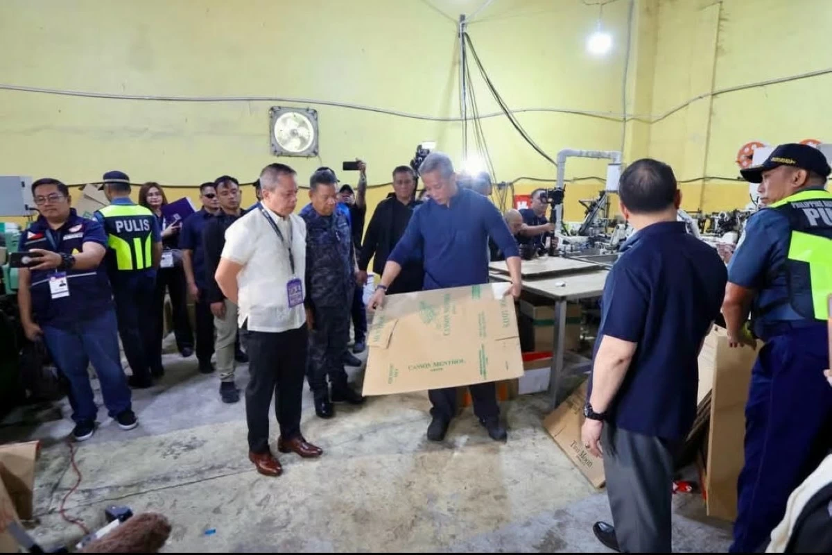 DILG Secretary Jonvic Remulla leads the inspection of the illegal cigarette factory in Mexico, Pampanga. (photo: PNP) 