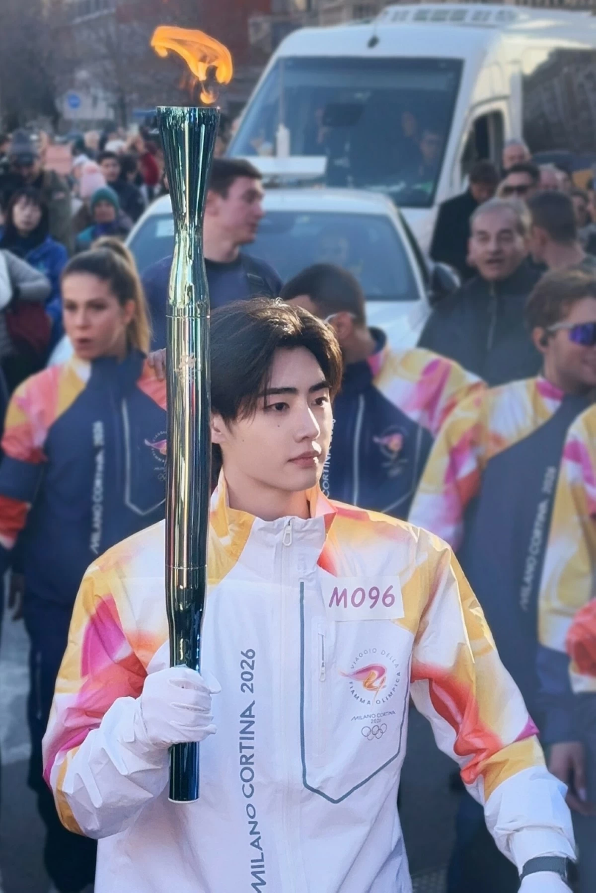 ENHYPEN's Sunghoon participating in the Olympic torch relay on Feb. 5 in Milan for the Milano Cortina 2026 Winter Olympics in Italy. (Belift Lab) 