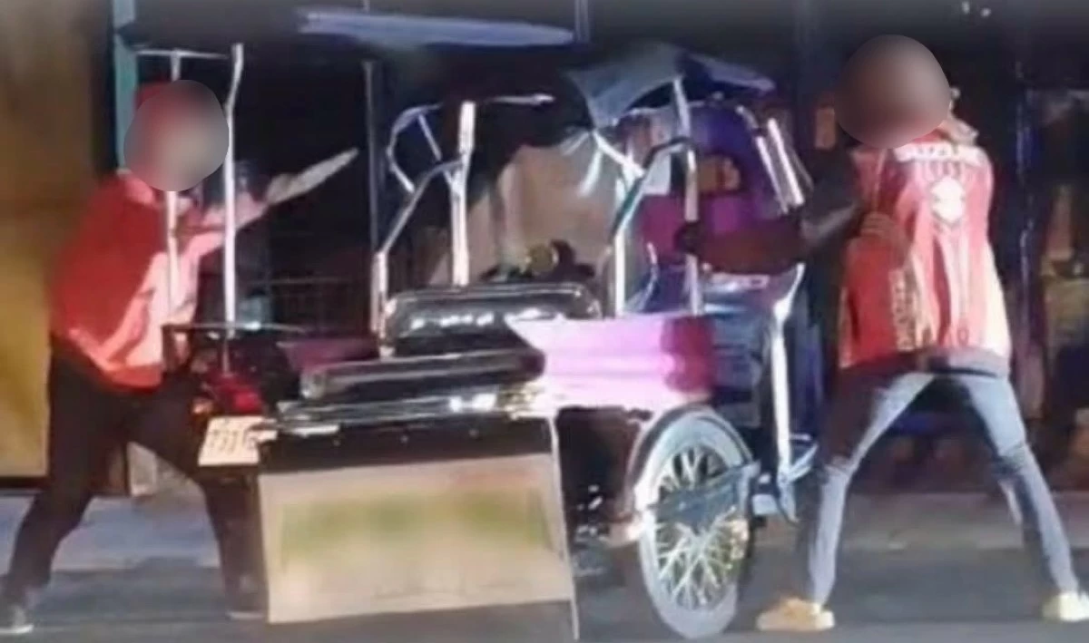 The suspect and the victim were caught on camera fighting over unpaid debt in Barangay San Jose, Antipolo City, on Thursday, Feb. 5. (Photo by Jay Martin)