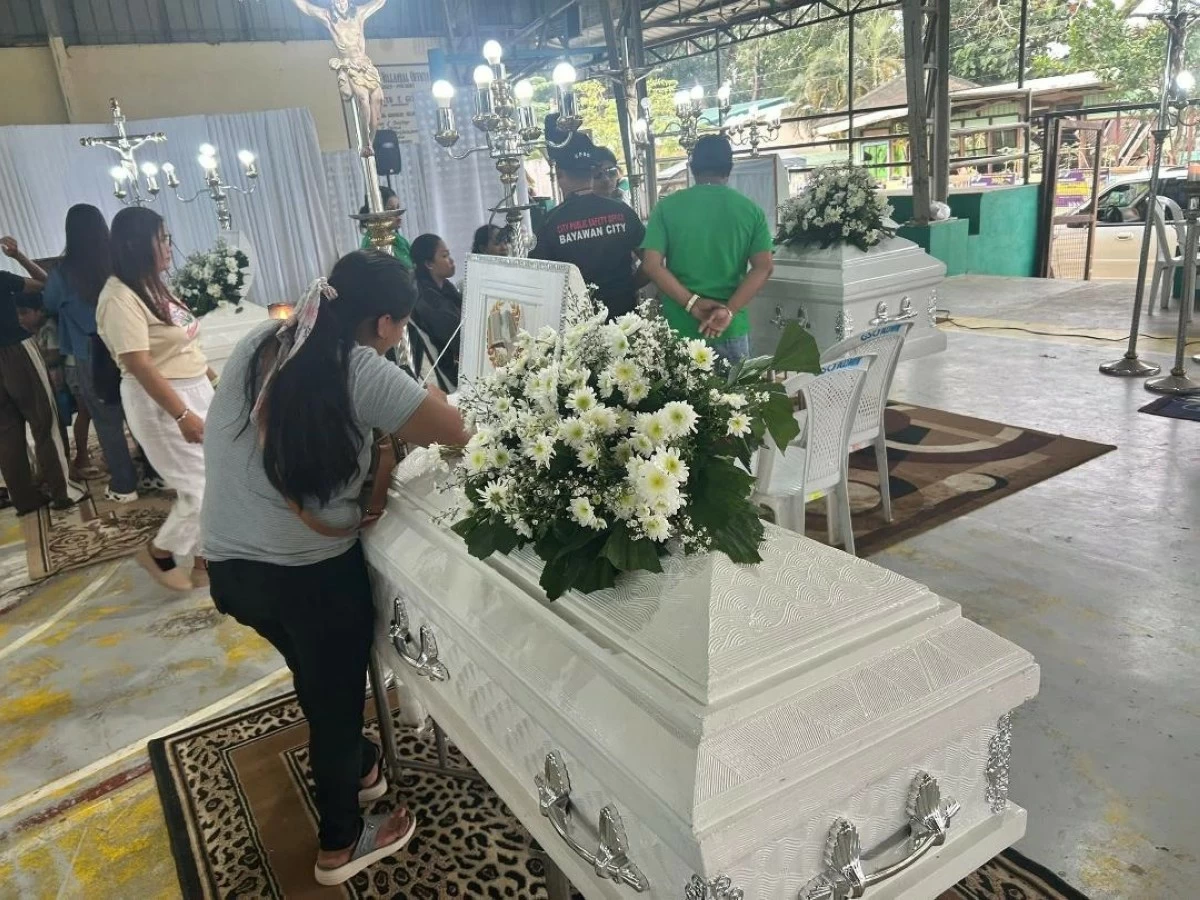 THE remains of eight government workers and a student intern killed in an accident lie at the Villareal Gymnasium in Bayawan City, Negros Oriental starting Thursday, Feb. 5. (Photo via Kuya Randy/K5 News FM)