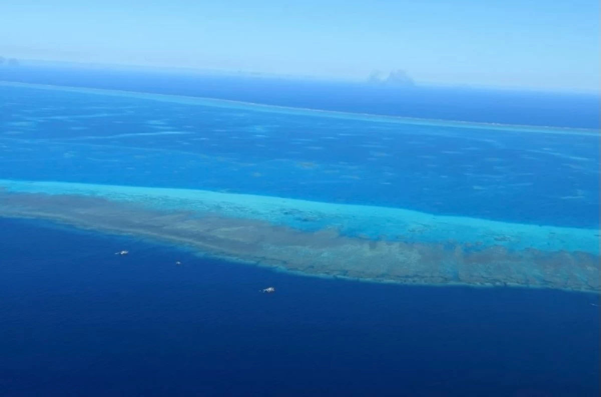 Filipino fishing boats are monitored at Bajo de Masinloc in the West Philippine Sea during an aerial search of the Philippine Coast Guard (PCG) on Oct. 6, 2022. (Photo: PCG)