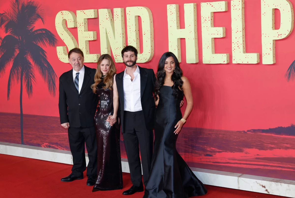 Director Sam Raimi, from left, Rachel McAdams, Dylan O'Brien, and producer Zainab Azizi pose for photographers upon arrival at the premiere for the film 'Send Help' in London. (Photo by Millie Turner/Invision/AP)