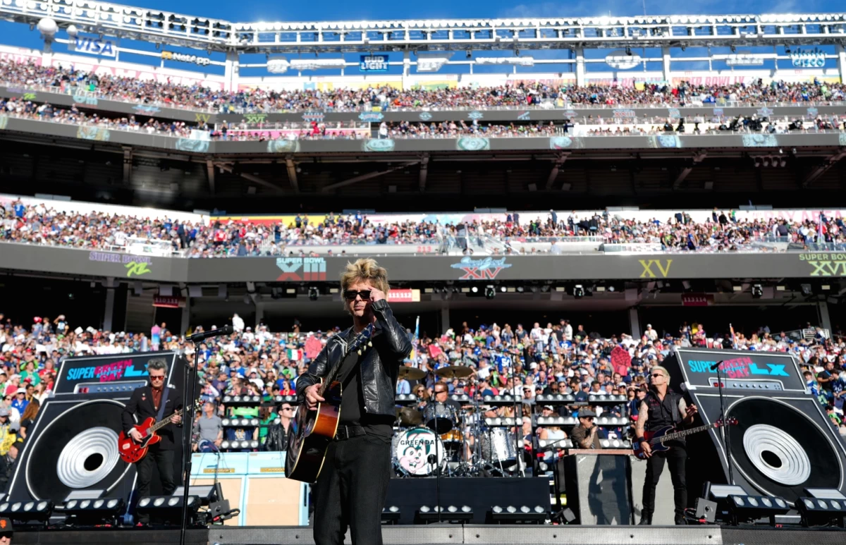 Billie Joe Armstrong, of Green Day performs before prior to the NFL Super Bowl 60 football game between the Seattle Seahawks and the New England Patriots, Sunday, Feb. 8, 2026, in Santa Clara, Calif. (AP Photo/Brynn Anderson)