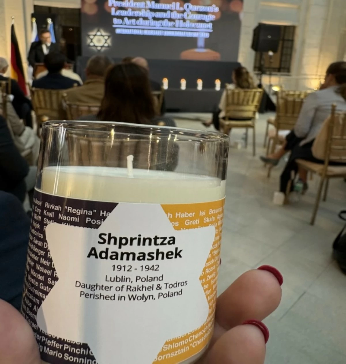 A candle inscribed with the names of Holocaust victims was shared with guests as a poignant 
token of remembrance