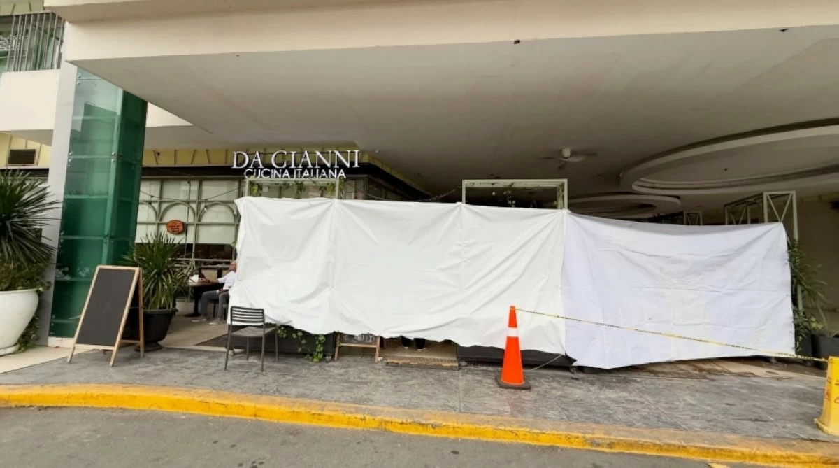 The damaged exterior of the Da Gianni Cucina Italiana restaurant in Alabang, owned by actor Matteo Guidicelli, is covered after an SUV rammed into the establishment on Feb. 8. (Photo from Guidicelli's Facebook account)