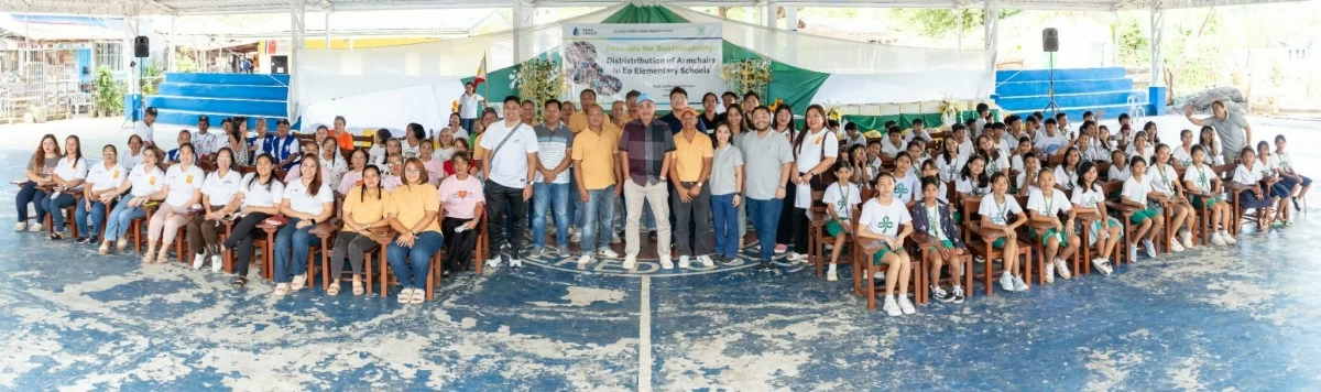 School children from various villages in Talim Island gather with Vena Energy officials and staff and local officials during the outreach program on the island in Rizal Province on Jan. 22.(photo from Vena Energy)