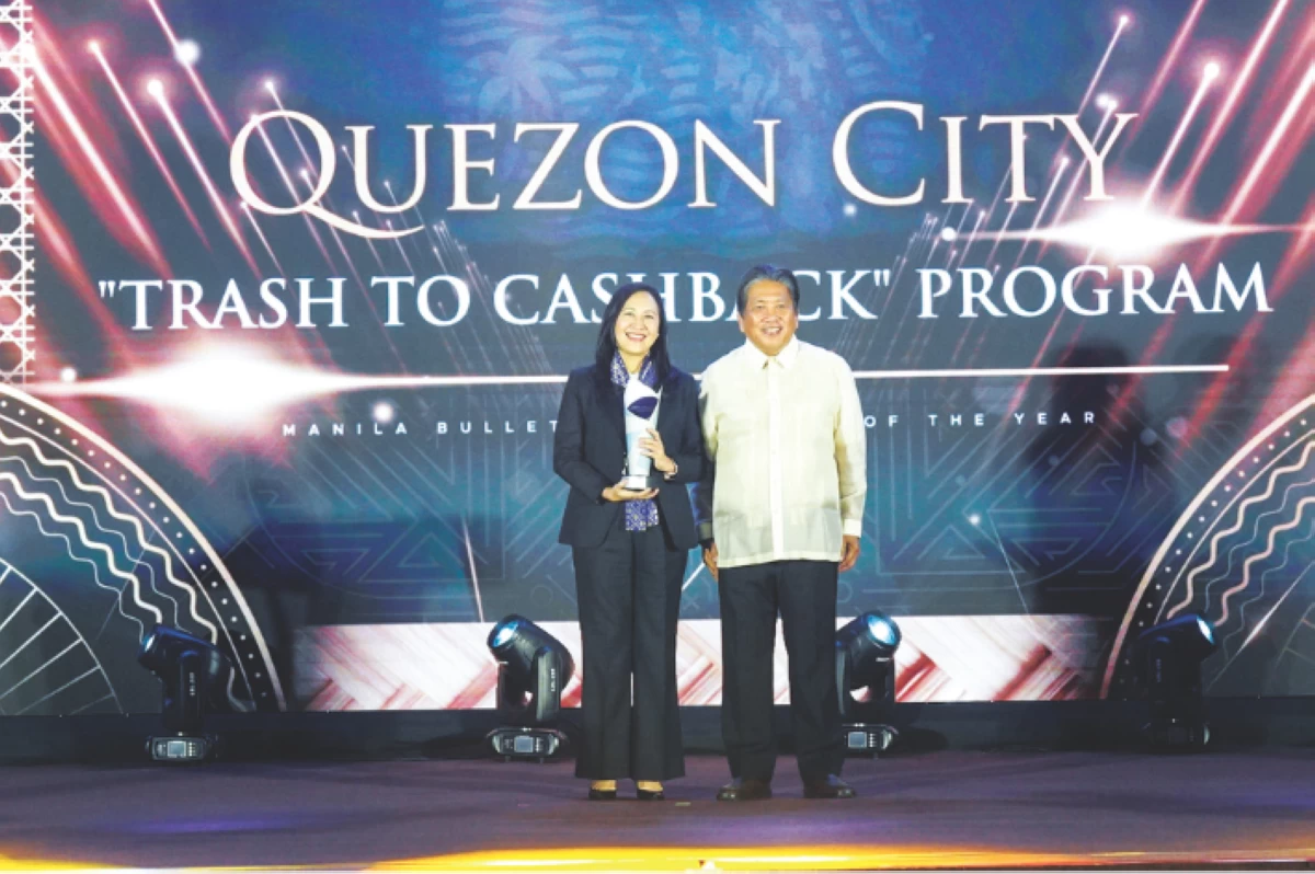 Quezon City Mayor Joy Belmonte and MB Publisher Sonny Coloma Jr.