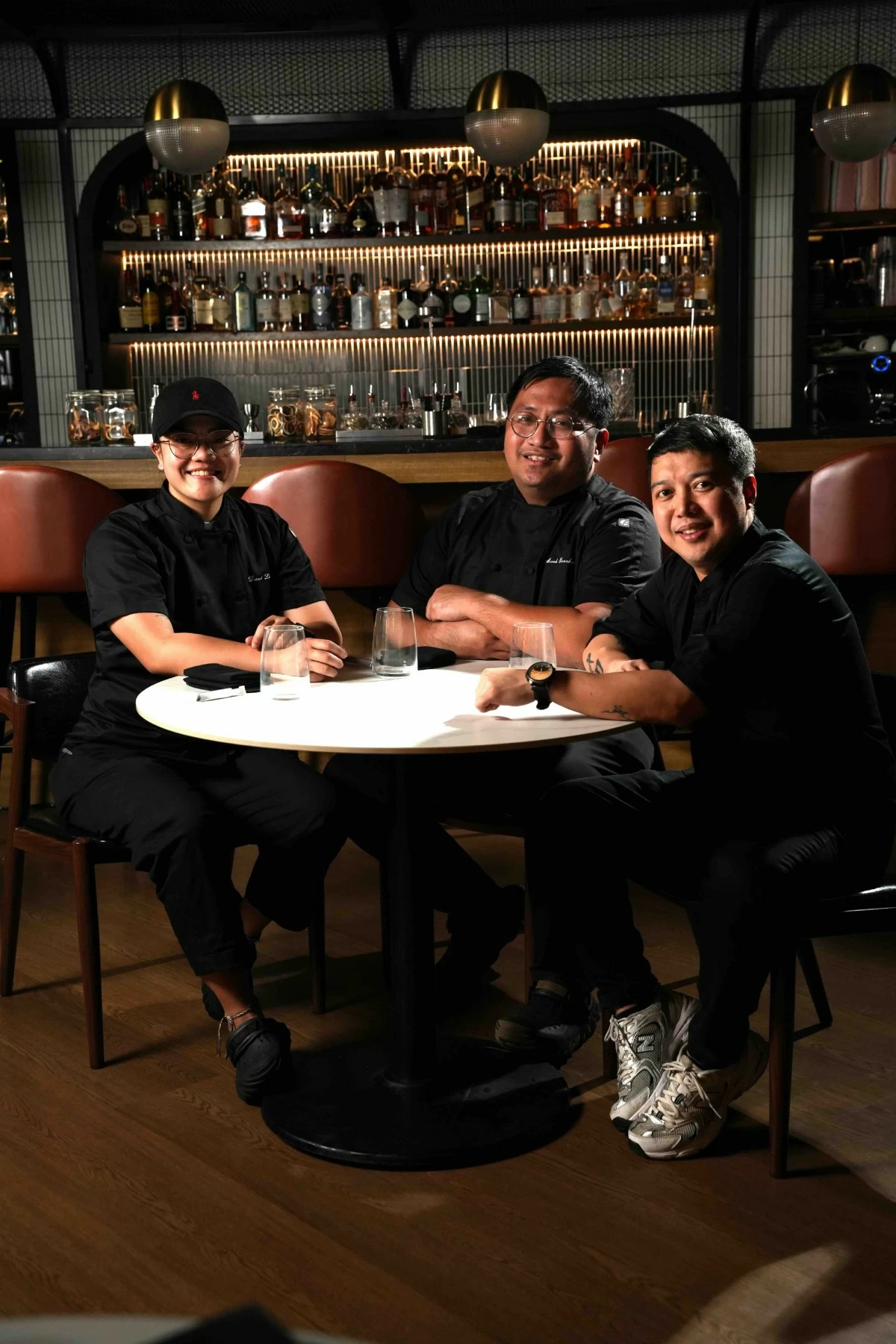 THE TRIO  From left, Sous Chef Christine Danielle Lim, Executive Chef Mark Jesraelle Sanchez and mixologist Jomer Calangian, the team behind Aurora’s anniversary 10-course tasting menu.