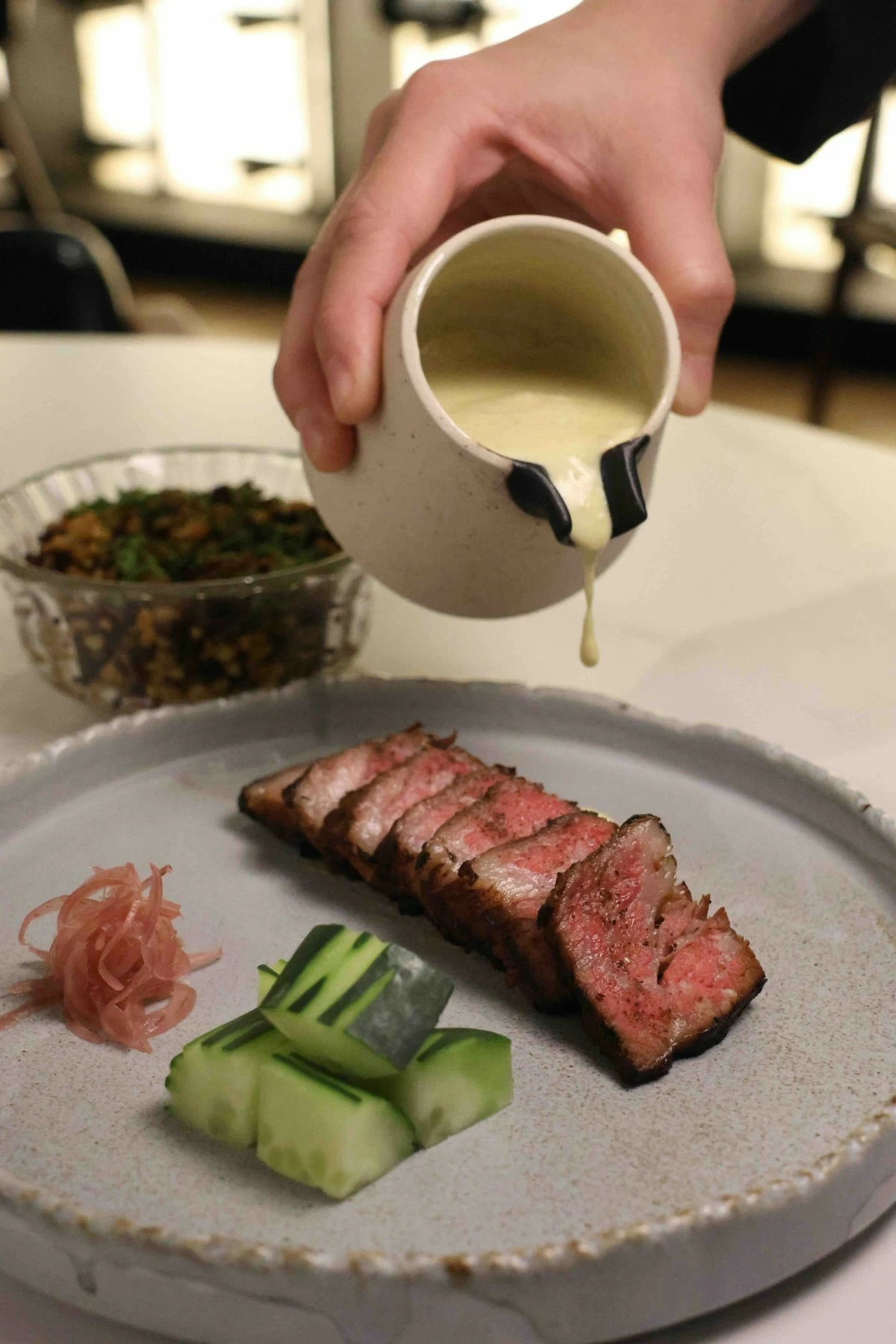 LONG BRAISE  Forty-eight-hour braised Angus beef short ribs served with green curry and pineapple heirloom rice.