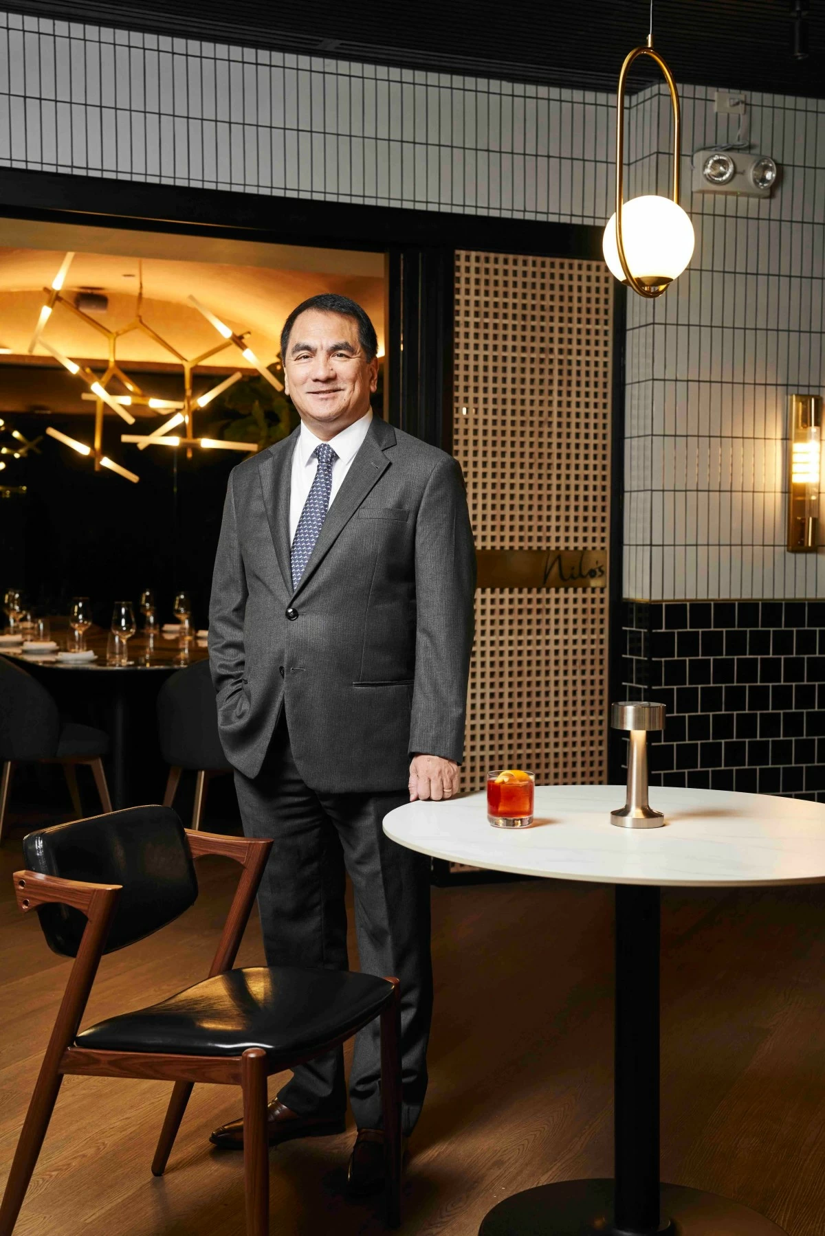 THE FOUNDER  Atty. Nilo T. Divina, founder and owner of Aurora, whose vision for the restaurant is rooted in memory, care and the discipline of home cooking passed down by his mother, Aurora.