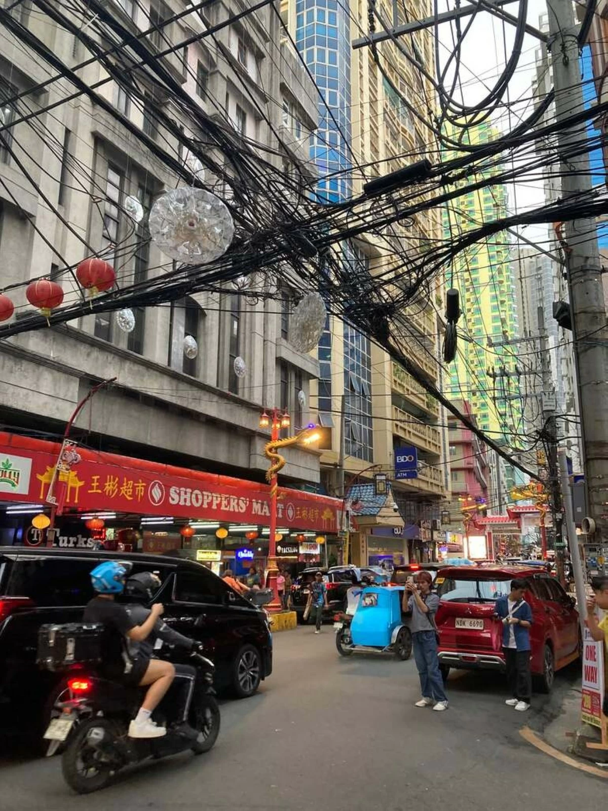 REMEMBER THE GOOD TIMES Binondo's lively streets and untouched buildings leave visitors with a sense of nostalgia.