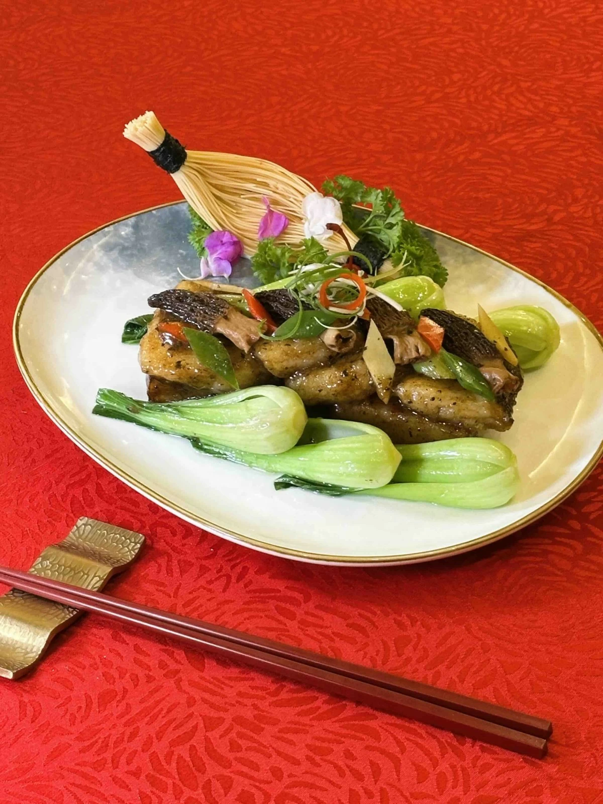 Braised Sea Bass and Turnip Cake with Morel Mushroom in Black Truffle Sauce