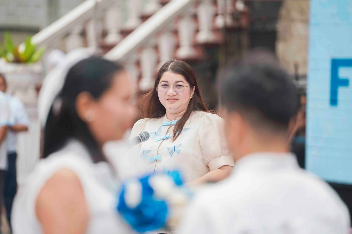 Marikina City Mayor Maan Teodoro solemnizes the marriage of 10 rider-couples in a mass wedding ceremony held at Kapitan Moy Plaza in Barangay Sta. Elena on February 12, 2026. (Photos from Marikina LGU)