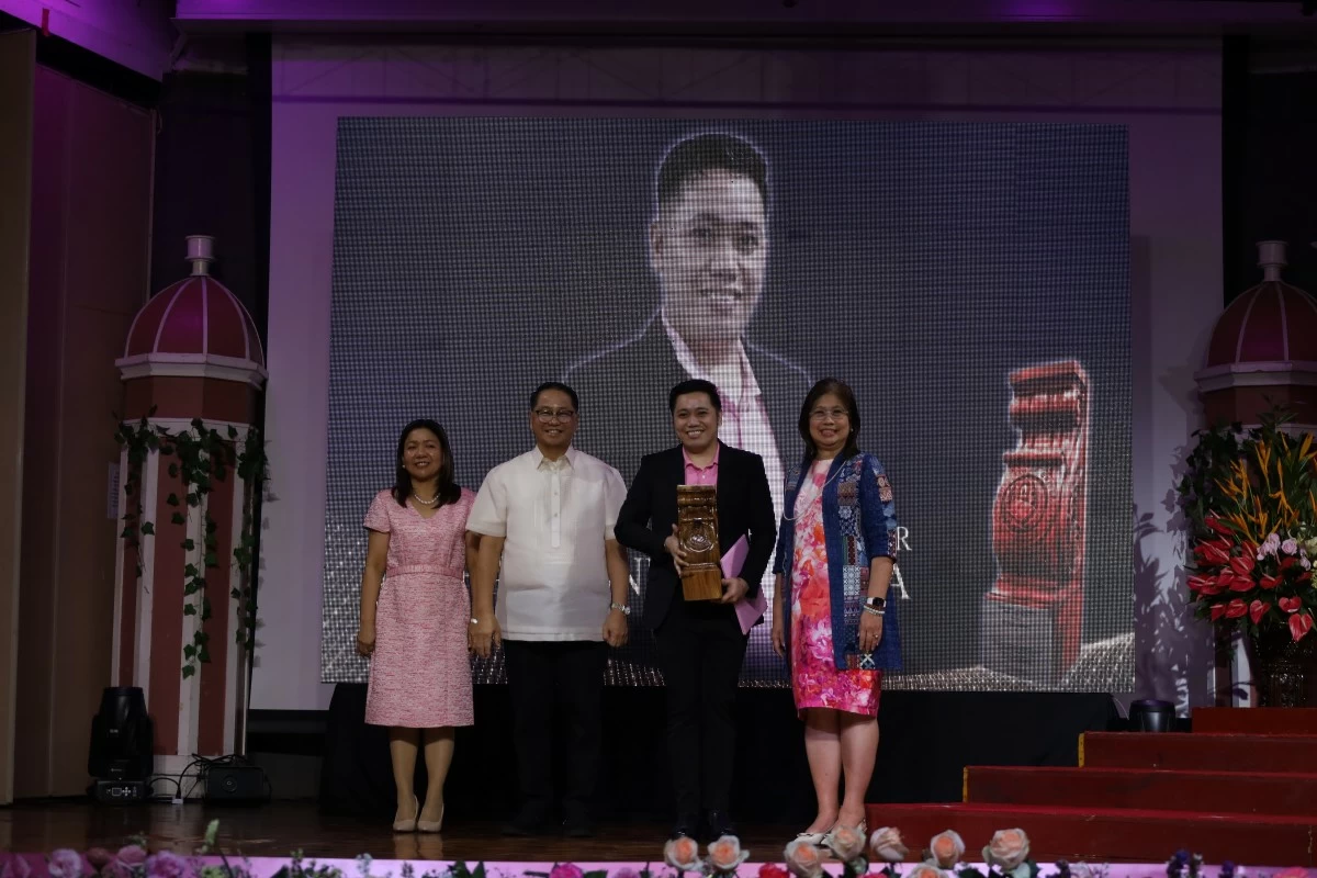 (From left) Dr. Cecilia C. Uncad, dean, School of Nutrition and Hospitality Management, Atty. Danilo L. Concepcion, CEU president and chief academic officer, Raymond Peralta, Teacher of the Year Awardee, and Dr. Teresa R. Perez, senior vice president for Academic Affairs