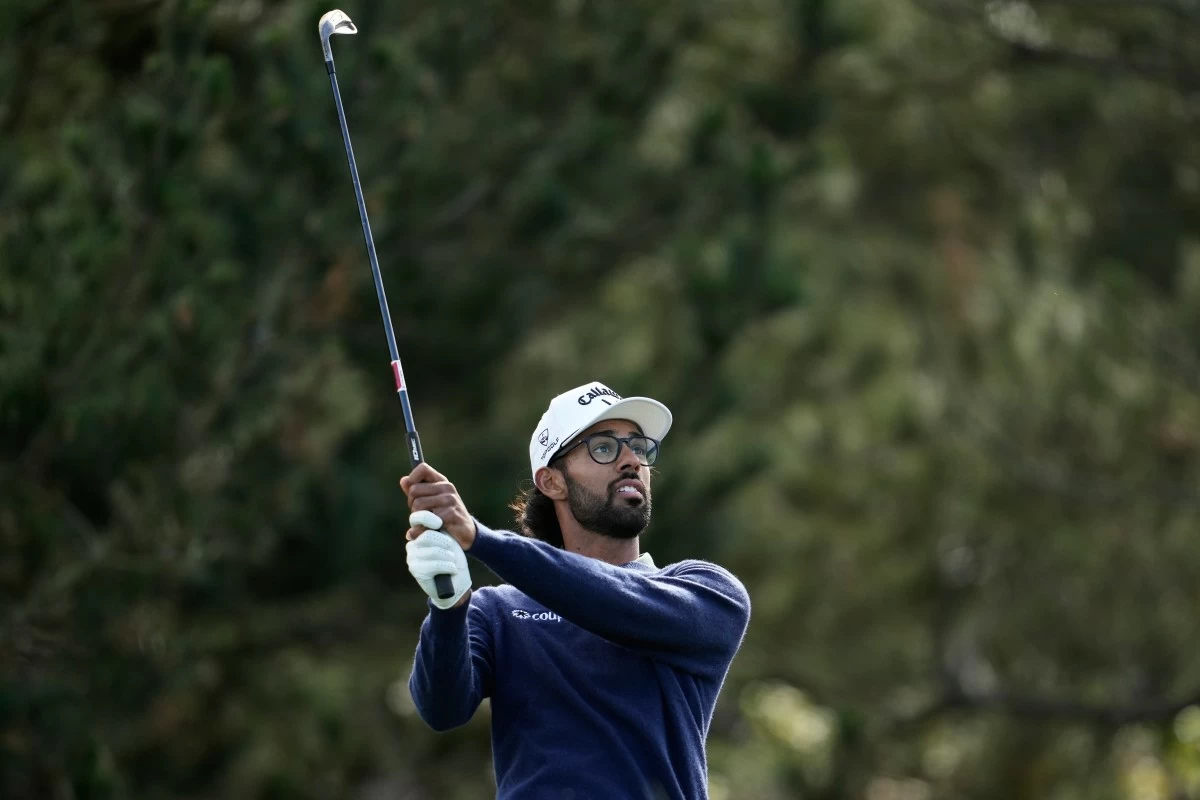 Akshay Bhatia hits from the third tee at Spyglass Hill Golf Course during the second round of the AT&T Pebble Beach Pro-Am golf tournament in Pebble Beach, Calif., Friday, Feb. 13, 2026. (AP Photo/Godofredo A. Vásquez)