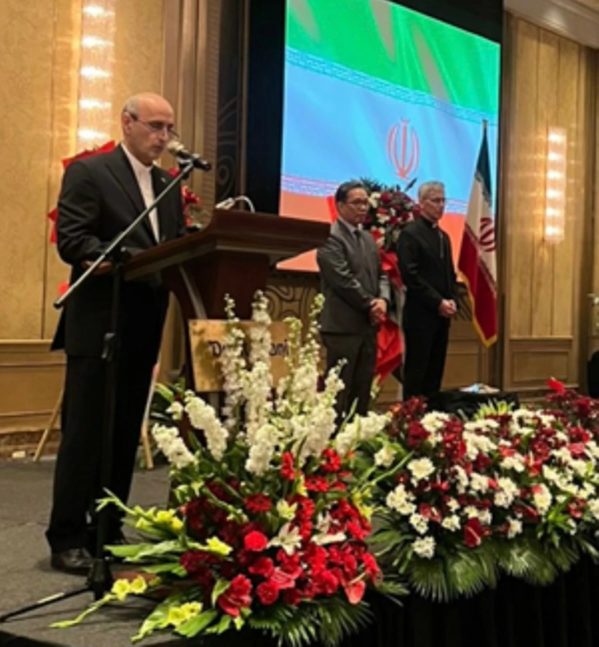 The Ambassador delivers his message with DFA Undersecretary Leo Herrera-Lim and Archbishop Charles Brown at the background
