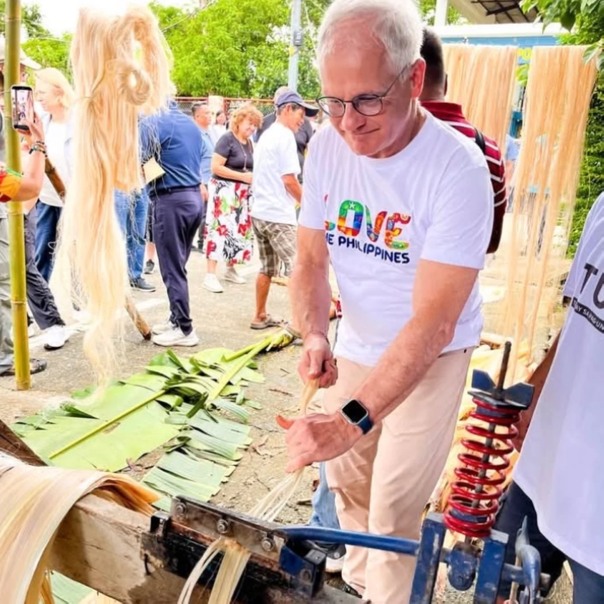German Embassy’s Ambassador Andreas Michael Pfaffernoschke tried his hand at weaving abaca fibers, embracing local craftsmanship 
