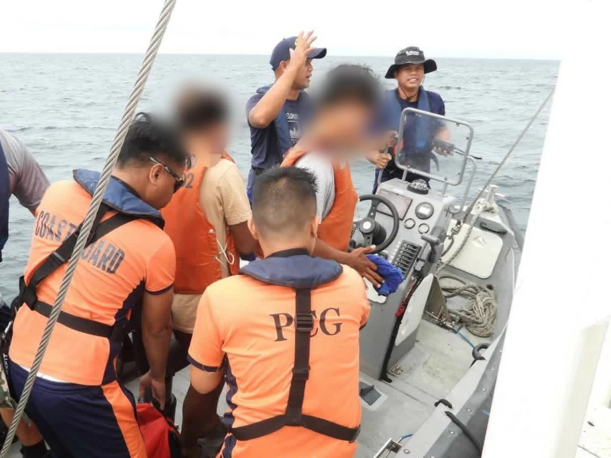 THE PCG rescues two distressed fishermen in Basilan. (PCG)