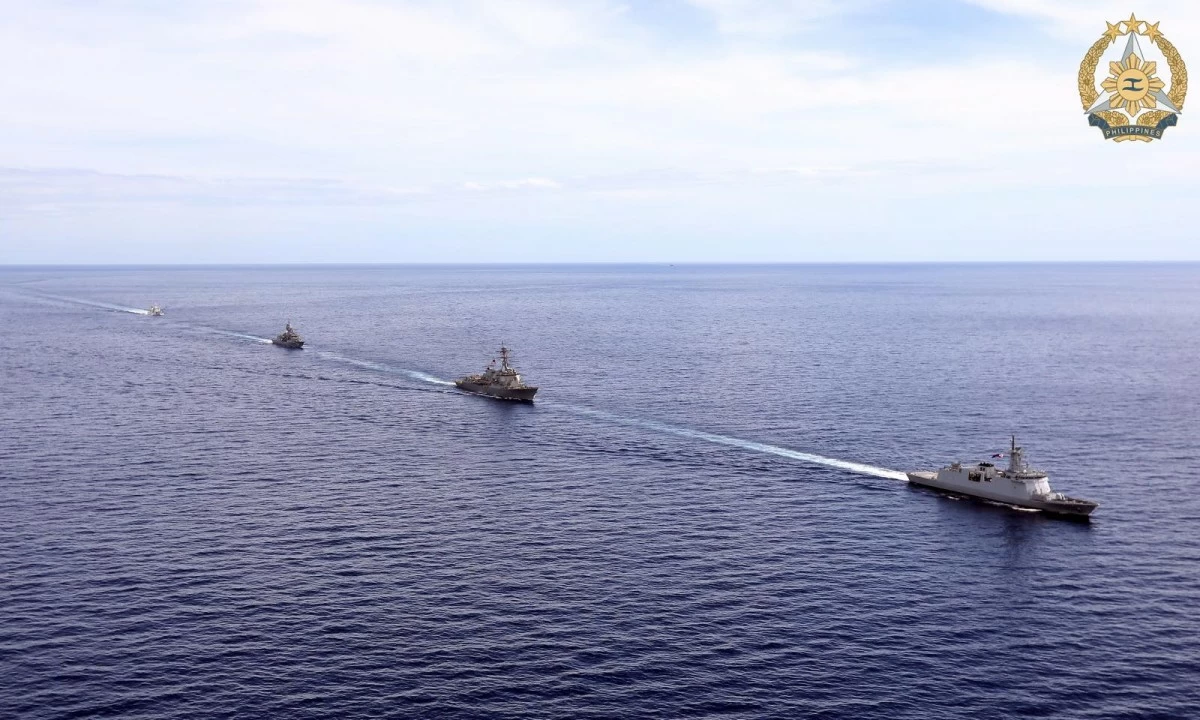 BRP Diego Silang (FFG7), USS Dewey (DDG 105), HMAS Towoomba (FFH 156), and BRP Teresa Magbanua (MRRV 9701) sail in coordinated formation during the 14th Multilateral Maritime Cooperative Activity with the Philippines, Australia, and United States in the West Philippine Sea on February 16, 2026. (Photo: AFP)