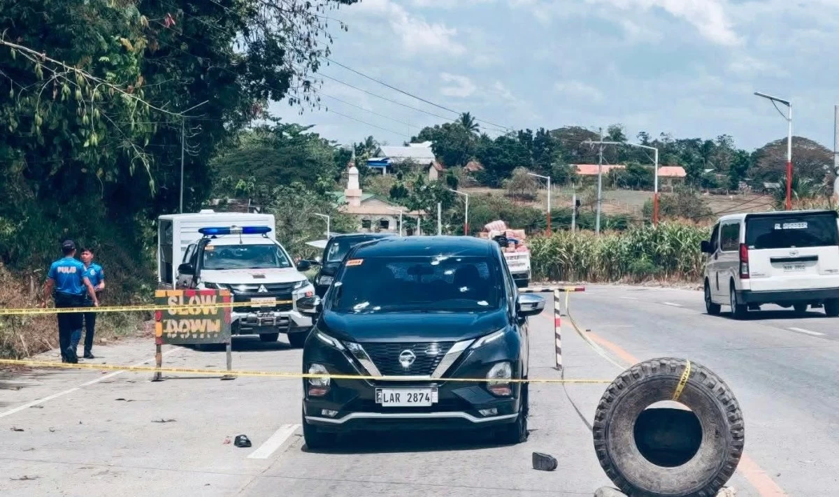 THE victims' car on the national highway in Maguindanao del Sur. (Bombo Radyo Koronadal FB)