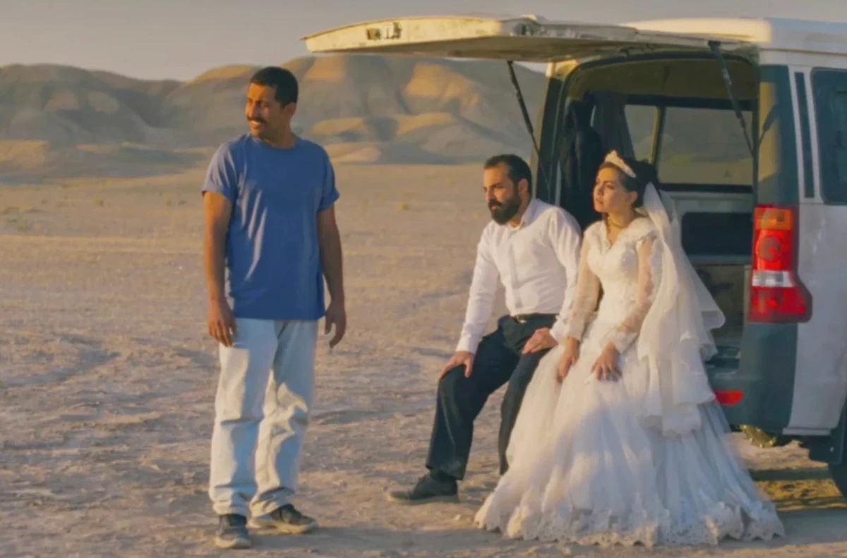 This image released by Neon shows, from left, Mohamad Ali Elyasmehr as Hamid, Majid Panahi as Ali, Hadis Pakbaten as Goli, in a scene from 'It Was Just an Accident.' (Neon via AP)