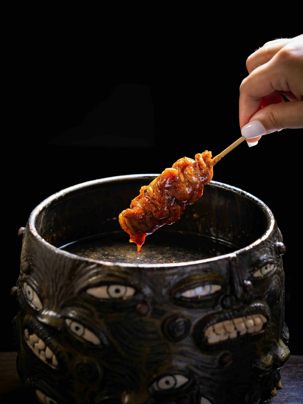 FRESH OFF FIRE A freshly grilled yakitori chicken skewer is served moments after leaving the grill