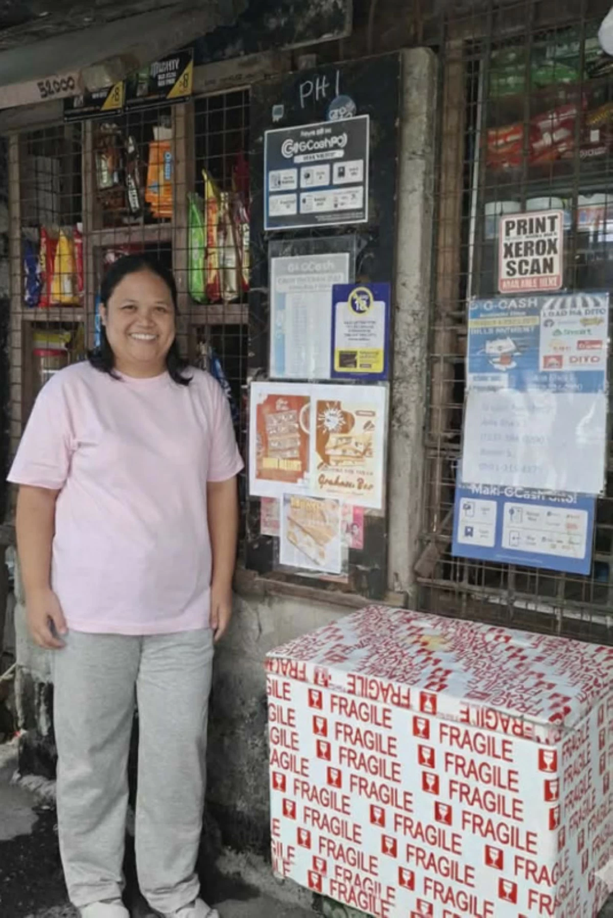 Anna Rhea Sarmiento, 41, runs a sari-sari store that helps support her family.