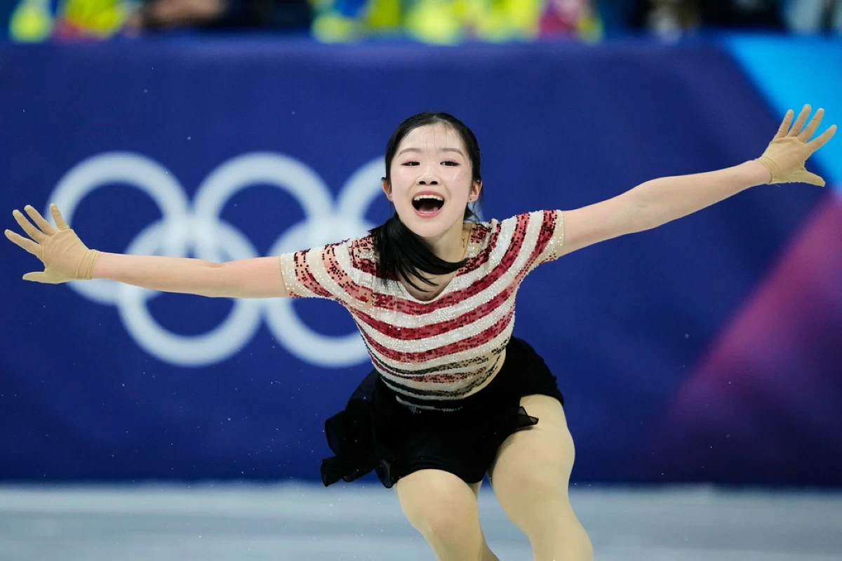 Ami Nakai of Japan competes during the women's short program figure skating at the 2026 Winter Olympics, in Milan, Italy, Tuesday, Feb. 17, 2026. (AP Photo/Natacha Pisarenko)