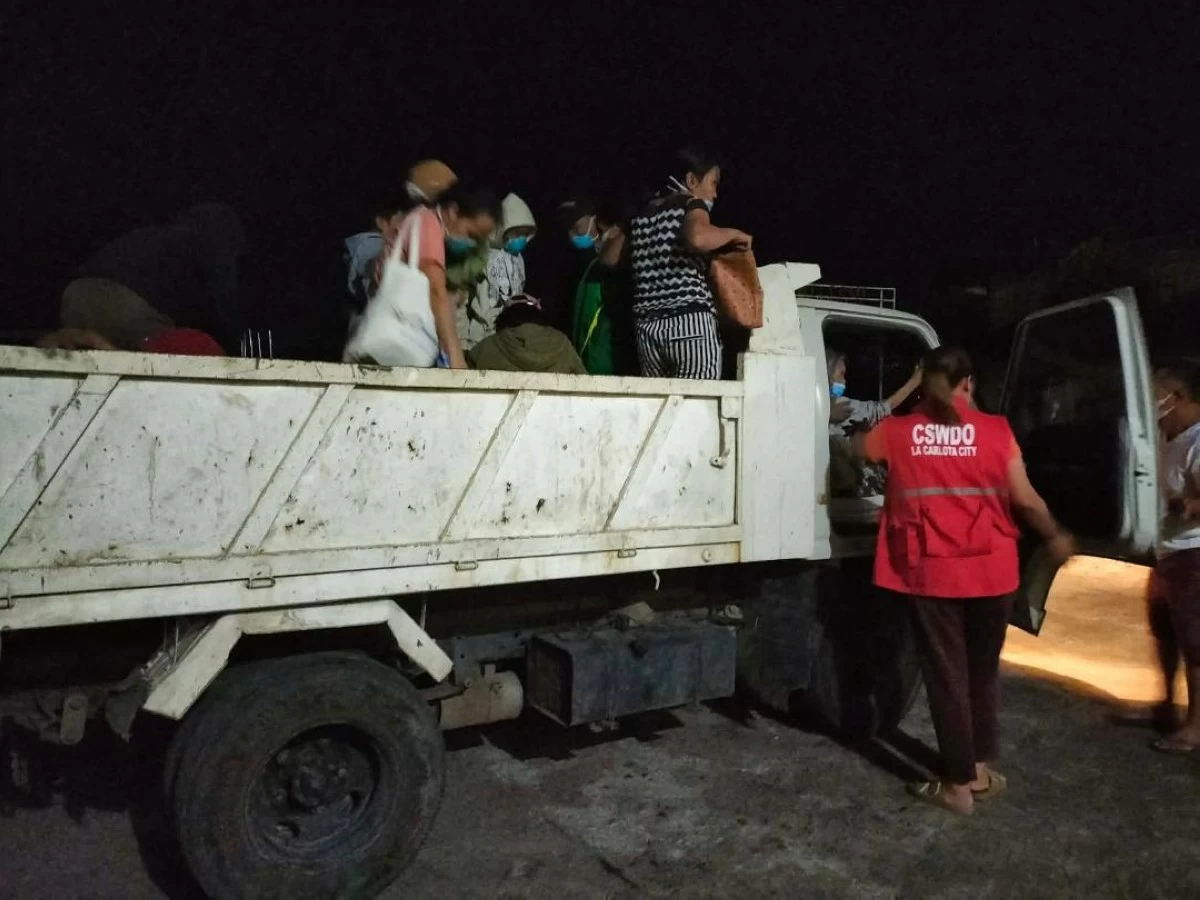 THIRTY-FOUR families from La Carlota City, Negros Occidental evacuate following the eruption of Kanlaon Volcano on Thursday, Feb. 19. (La Carlota City PIO)
