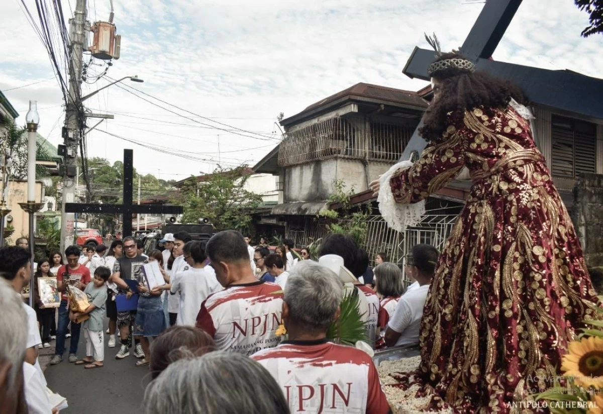 Parishioners join the Way of the Cross procession in the streets of Antipolo City (Photo from Antipolo Cathedral's Facebook)