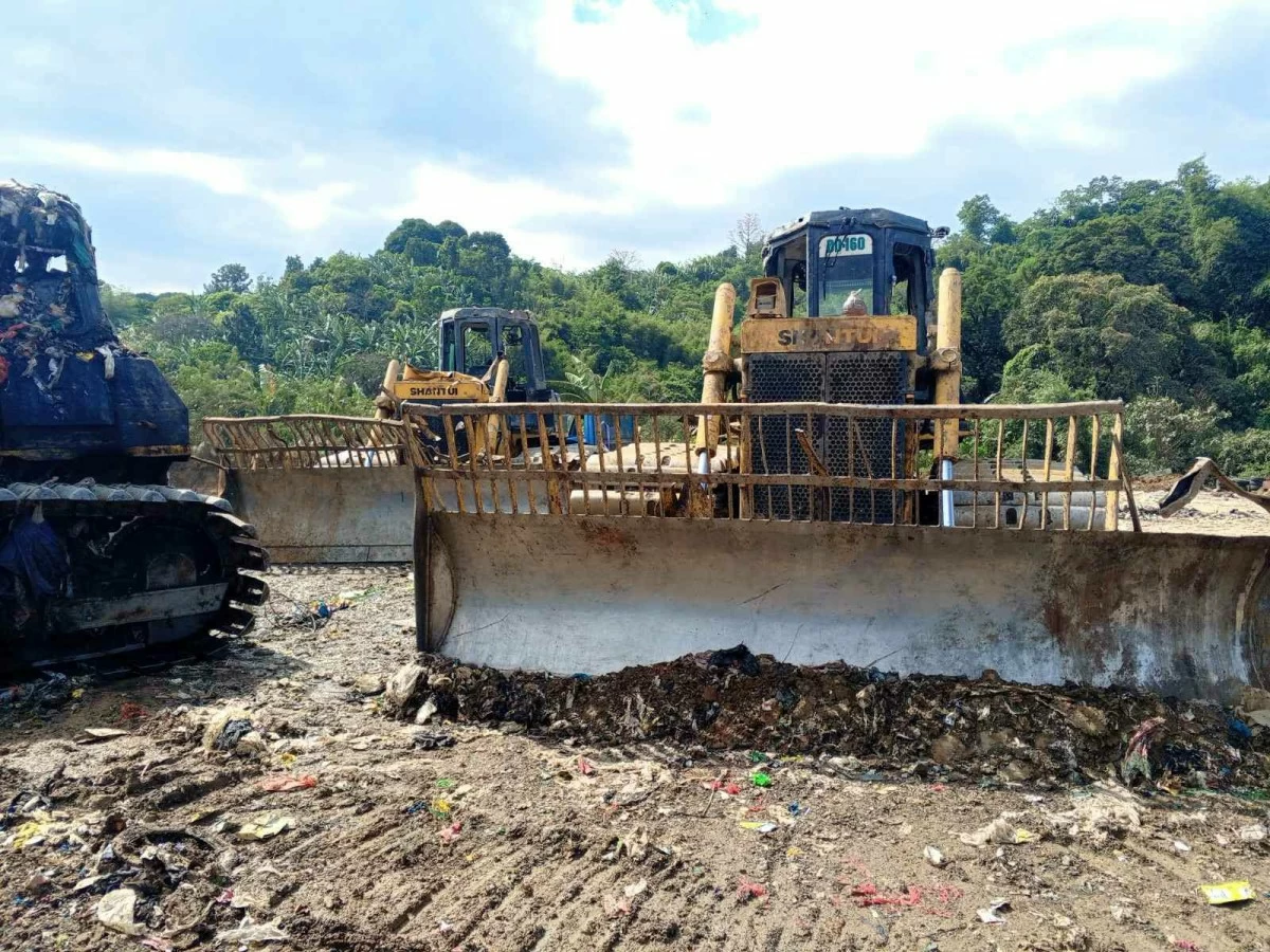A photo of the bulldozer in the Rodriguez landfill similar to the one that was buried in the trash (Photo from Lt. Col Gaffud)
