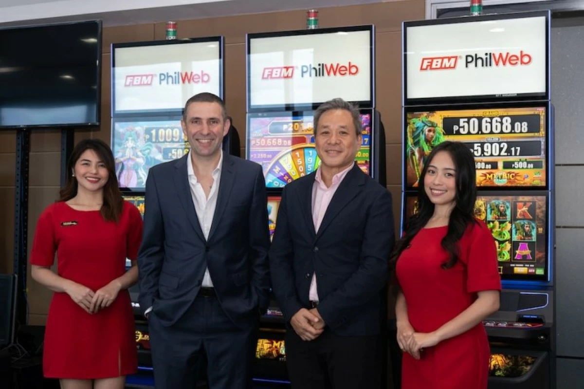 FBM Philippines Country Manager Pepe Costa and PhilWeb Corporation President Brian Ng after signing the partnership agreement
