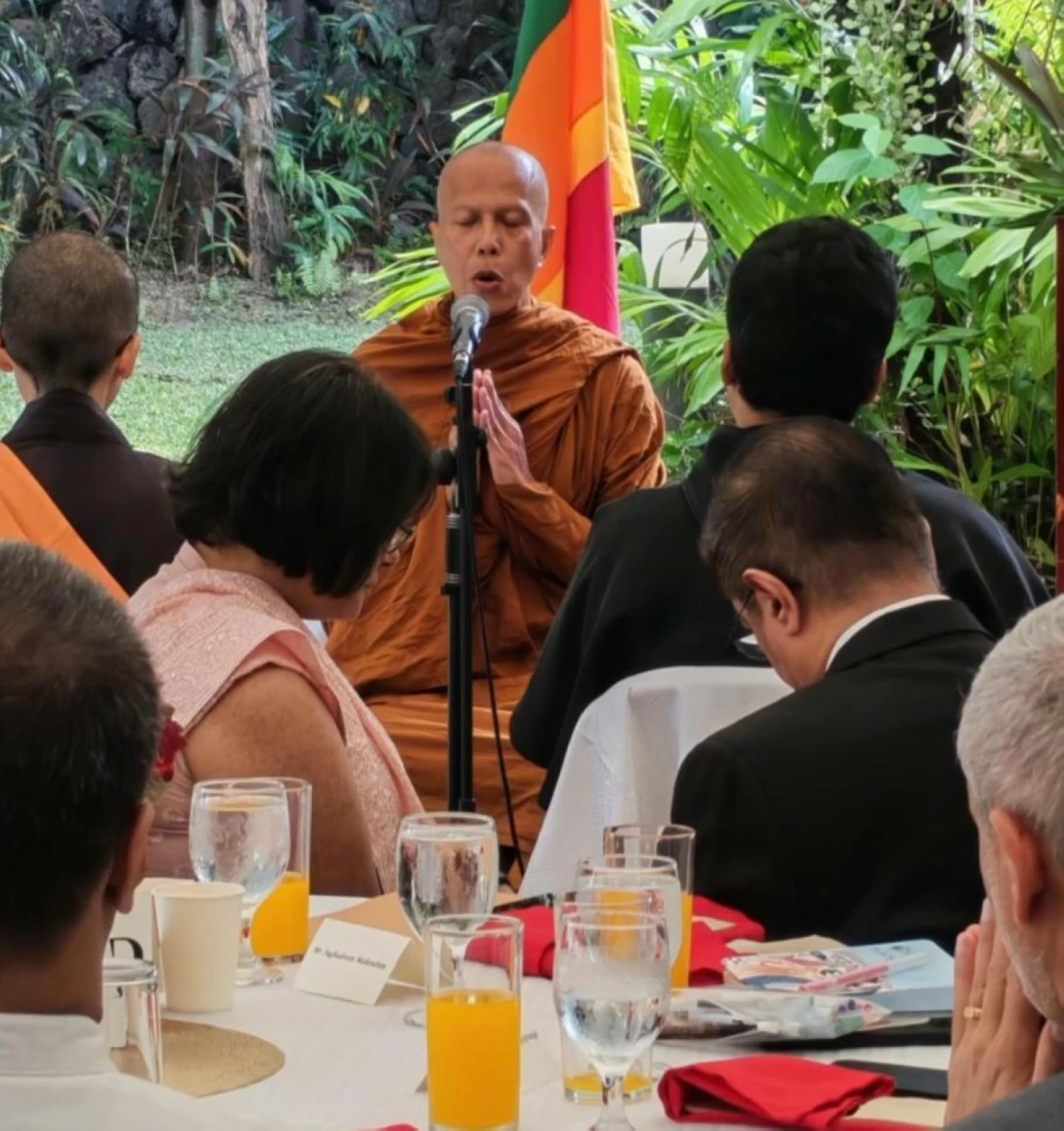 Ven. Ratthapalo conducts a religious observance, in accordance with the Theravada Buddhist faith.


