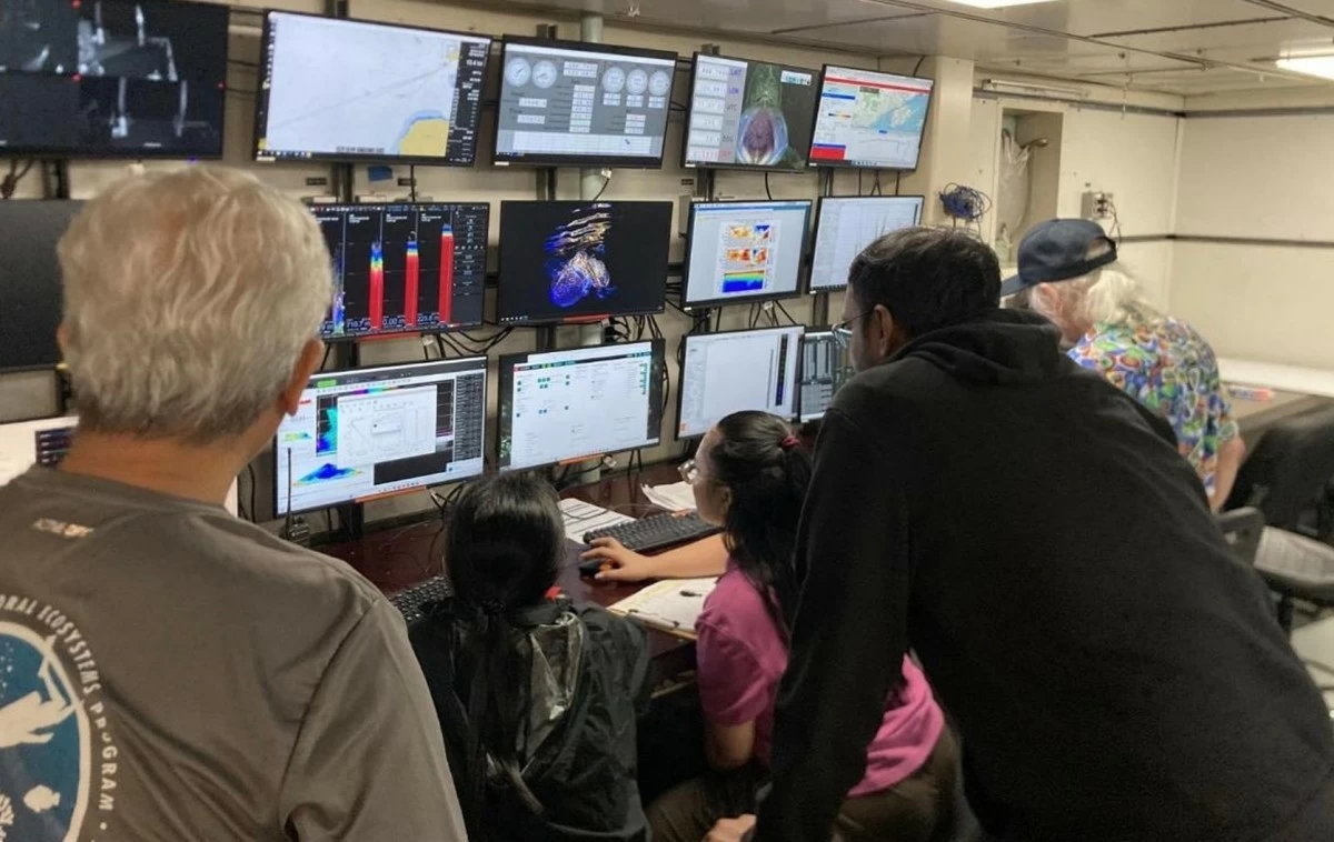 Members of the Philippine research team operate the EK80 echosounder, EM-124 multibeam echosounder, and SBP-29 sub-bottom profiler during 24/7 survey operations aboard the R/V Thomas G. Thompson as part of the December 2025 deep-sea expedition to the Sulu Sea, Celebes Sea, and southern Philippine Sea. (Photo by Laurice Dagum/University of the Philippines-Marine Science Institute)