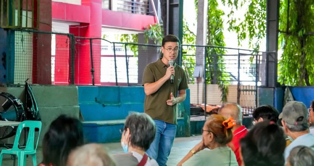 Quezon City Rep. Juan Carlos 'Arjo' Atayde talks to his constituents