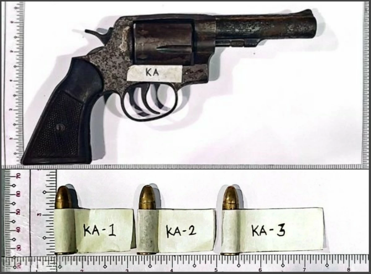 The confiscated firearm and live ammunition (Photo from Taguig police / SPD) 
