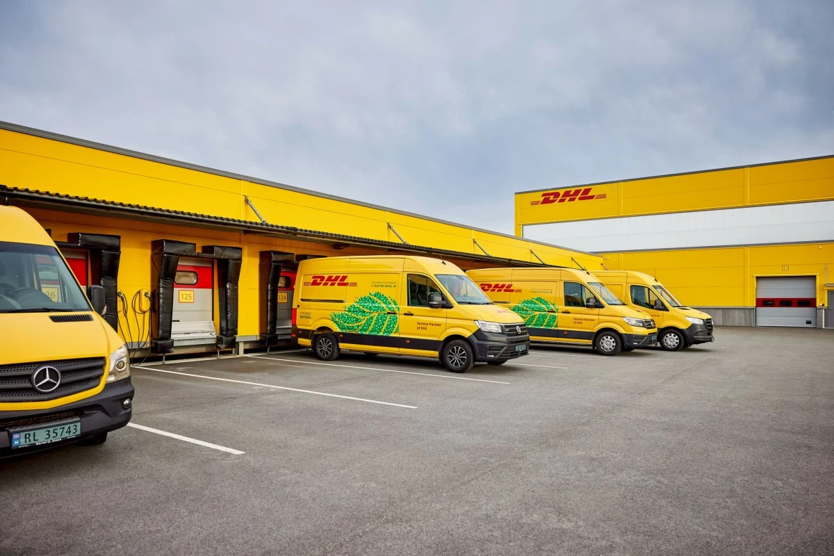 DHL delivery vans parking in a car park at the hub.
