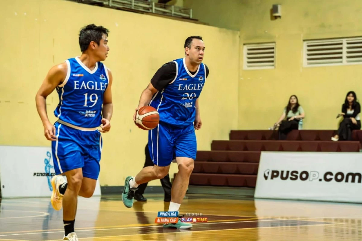 Greg Slaughter dribbles the ball for the Ateneo Blue Eagles-Banh Mi Kitchen as Jai Reyes looks on during their game against the Adamson Soaring Falcons-Shawarma Shack in the Pinoyliga Alumni Cup over the weekend. (Pinoyliga Photo)