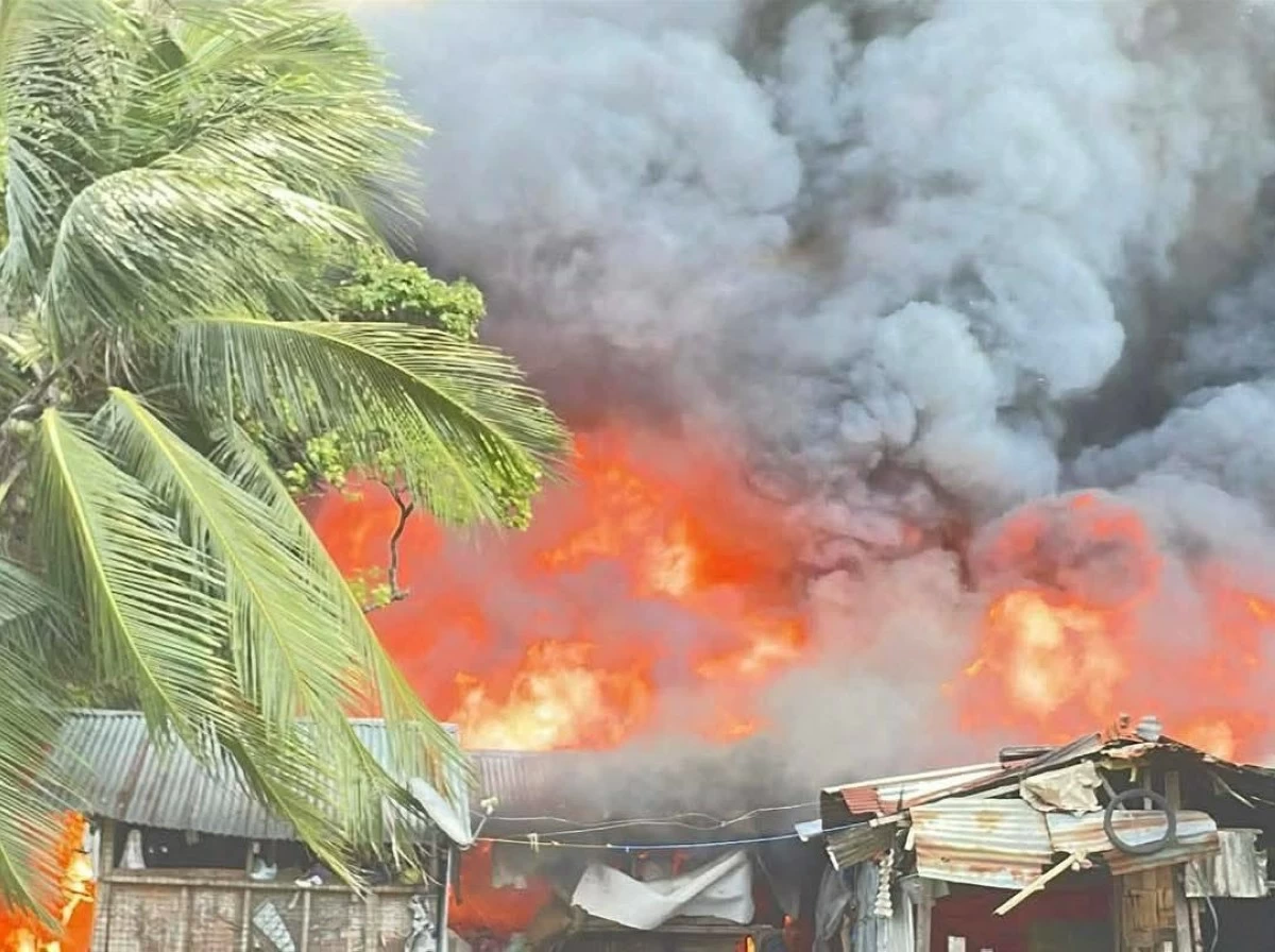 
A FIRE  destroyed at least 100 homes in Barangay 39, Bacolod City on Friday, Feb. 27. (Chamber Volunteer Fire Brigade)
