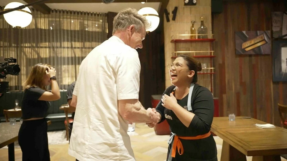 Chef Gordon Ramsey sharing a fun moment with Abi